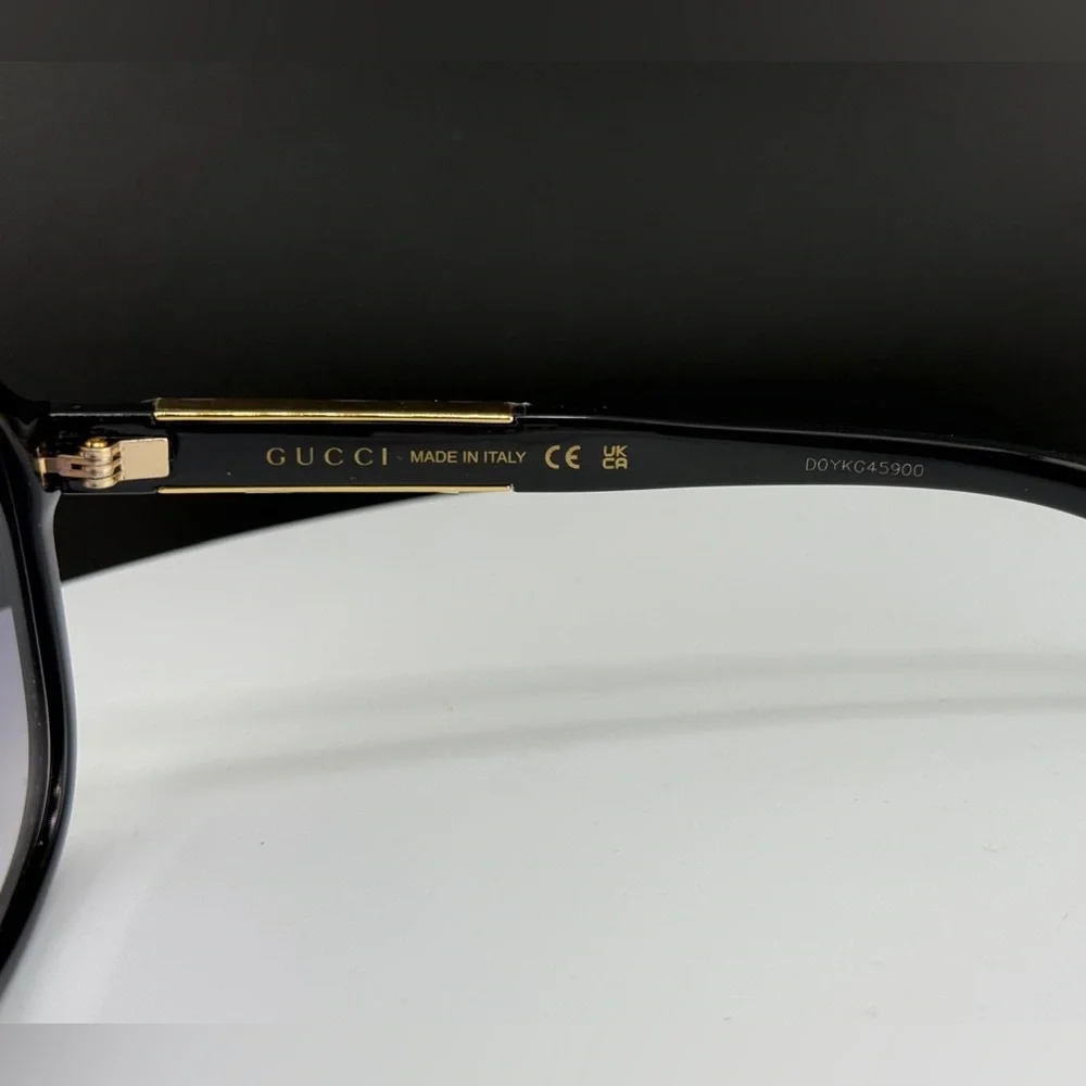 Gucci Black Sunglasses with Gold Logo Accent